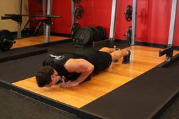 Flexiones diamante: posición final